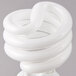A Satco warm white spiral light bulb.