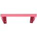 A pink rectangular shelf with two holes on the left side.