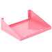 A pink plastic shelf with metal frame and holes.