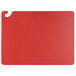 A red rectangular San Jamar plastic cutting board with a hook.