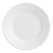 An Acopa bright white stoneware plate with a wide rolled edge.