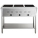 A stainless steel ServIt electric steam table with three black knobs.