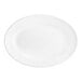 An oval bright white stoneware platter with a wide rim.