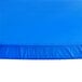A blue plastic round tablecloth with white elastic edges.