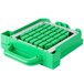 A green plastic box with a handle and a white Prince Castle Saber King Lettuce Chopper Blade and Pusher Head Assembly inside.
