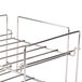 A metal Prince Castle Saber King wire rack with two shelves and metal rods.