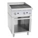 A stainless steel Cooking Performance Group natural gas grill with knobs and a shelf.