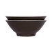 A white melamine bowl with a chocolate brown interior and white rim.