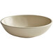 A beige Elite Global Solutions melamine bowl with a white background.