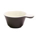 An Elite Global Solutions Durango melamine bowl with a handle in antique white and chocolate with a white handle.