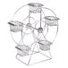 A Clipper Mill by GET chrome metal ferris wheel rack with four baskets on it.