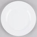 A white Elite Global Solutions melamine plate with a white rim.