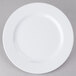 A white Elite Global Solutions melamine plate with a white rim on a gray background.