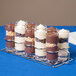 A Clipper Mill stainless steel dessert caddy with 10 desserts in glasses.