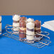 A Clipper Mill stainless steel rack holding 10 desserts in glasses.
