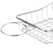A Clipper Mill stainless steel wire boat basket with condiment holder.