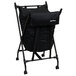 A black mobile laundry lifter stand with a black bag.