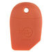 An orange plastic tag with a hole.