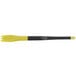 A yellow and black Mercer Culinary silicone brush with a black tip.