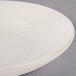 A white Homer Laughlin FlipSide bowl with a rim.