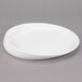 A white Libbey Slenda Verve porcelain plate with a curved edge.