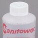 A close-up of a Manitowoc ice machine sanitizer bottle.