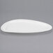 A white oval Libbey porcelain plate.