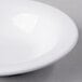 A Libbey Royal Rideau white porcelain fruit bowl with a white rim.