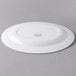 A white Libbey oval porcelain platter with a wide rim.