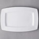 A white rectangular Libbey porcelain plate with a small rim.