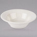 A white bowl with a decorative edge.