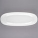 A white Libbey oval porcelain plate with a white rim.