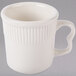 A white Tuxton Hampshire china mug with a handle.