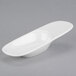 A white Libbey Royal Rideau porcelain spoon with a curved bowl.