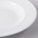 A Libbey Royal Rideau white porcelain bowl with a white rim.