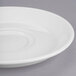 A close up of a Libbey Royal Rideau white porcelain tea saucer with a rim.