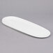 A white oval porcelain tray with a handle.