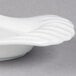 A white porcelain tray with curved edges.