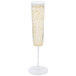 A clear plastic champagne flute filled with champagne and bubbles.