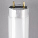A close-up of a Satco shatterproof white fluorescent cylinder with brass screws.