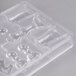 A clear plastic Matfer Bourgeat chocolate mold with different shapes.