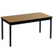 A brown rectangular Correll library table with black legs.
