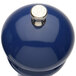 A close-up of a blue Chef Specialties pepper mill with a silver top.