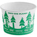 An EcoChoice white paper cup with green trees and the words "Save Our Planet" on a counter.