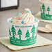 Two EcoChoice compostable paper ice cream cups with tree designs on a counter.