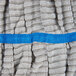 A blue band on a gray and white Unger SmartColor string mop head.