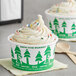 Two EcoChoice compostable paper cups of ice cream with sprinkles on a counter.