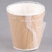 A brown Lavex paper hot cup with plastic wrap on top.