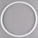 A white plastic gasket with a white circle.