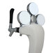 A Micro Matic Maxi Panther ice frosted chrome tap tower with lighted medallions and three black tap handles.